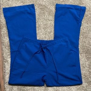 Royal blue scrub pants.